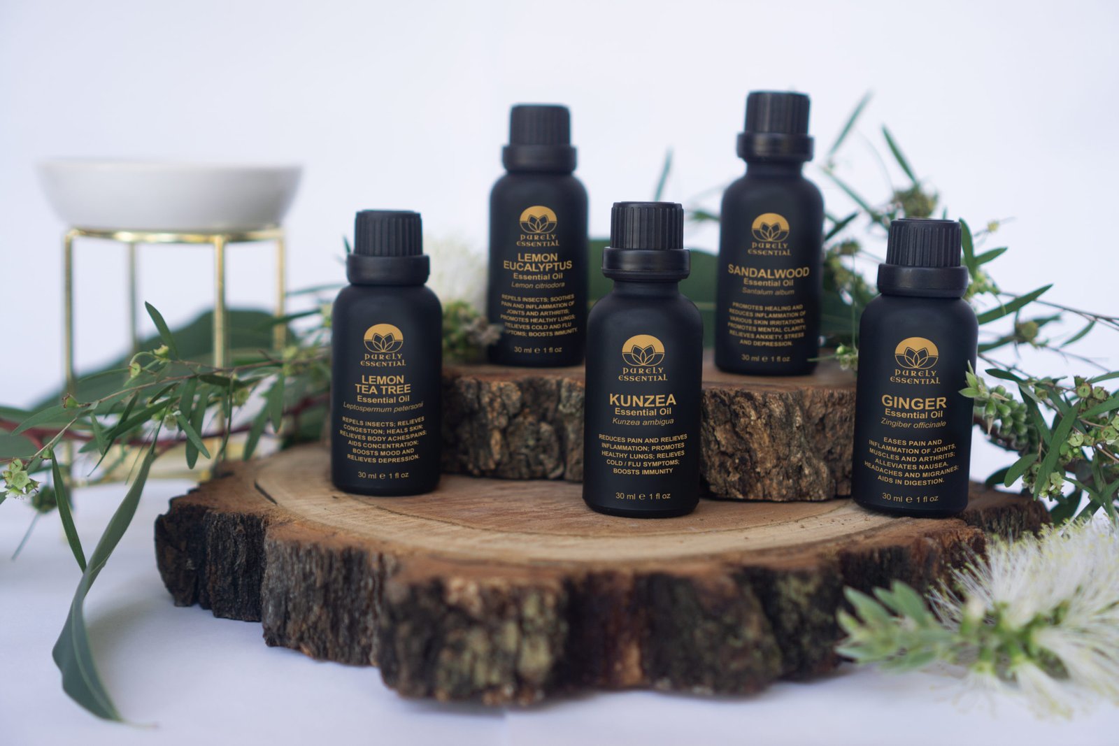 Collection of Purely Essential branded individual oils.